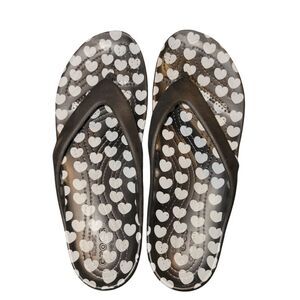 Crocs flip flops with hearts size 10. ^